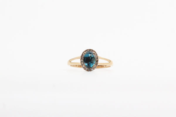 Yellow Gold Oval London Blue Topaz Split Shank Halo Ring