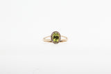 Yellow Gold Oval Peridot Split Shank Halo Ring