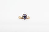 Yellow Gold Oval Tanzanite Split Shank Halo Ring