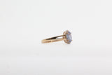 Yellow Gold Oval Tanzanite Split Shank Halo Ring